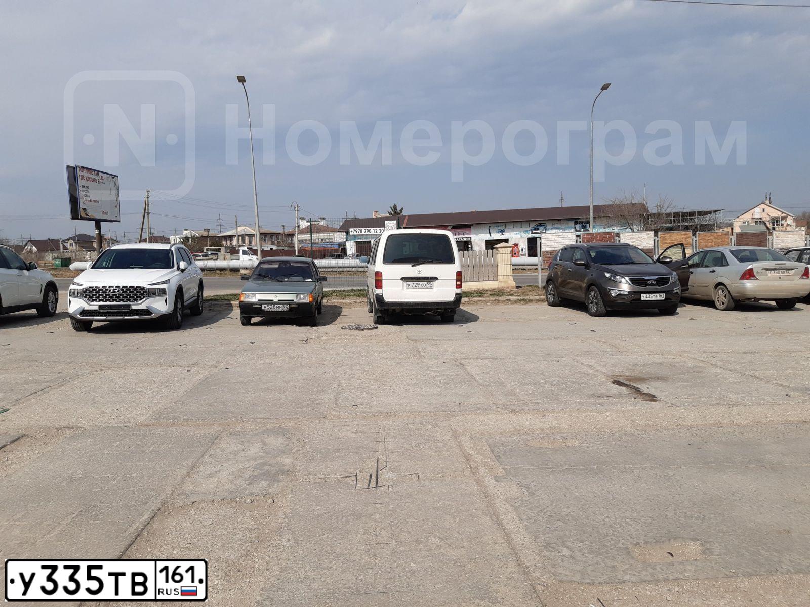 Фото автомобиля KIA SPORTAGE, 2014 — госномер У335ТВ161. Цвет: КОРИЧНЕВЫЙ
