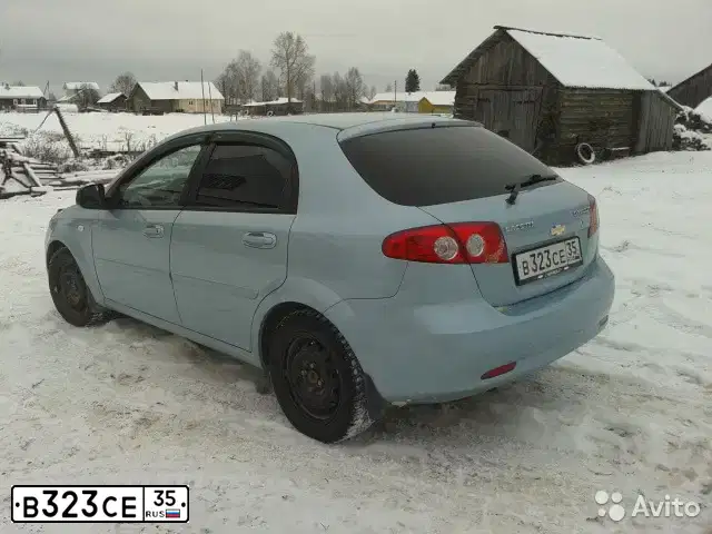 Фото автомобиля CHEVROLET LACETTI, 2012 — госномер О107ТК29. Цвет: синий