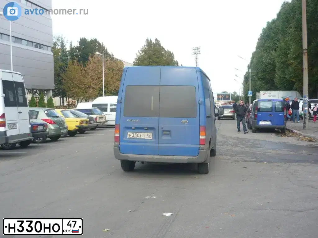 Фото автомобиля RENAULT LAGUNA, 2004 — госномер Н330НО47. Цвет: СВЕТЛО-СЕРЫЙ