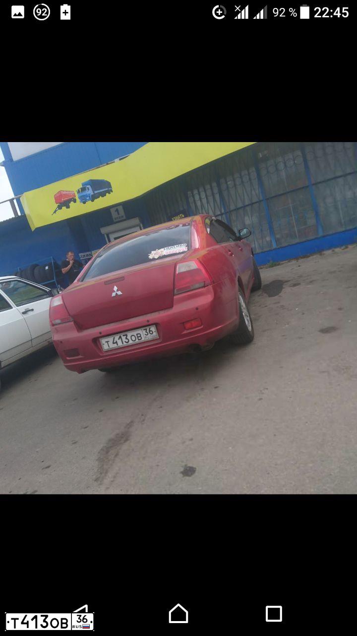 Фото автомобиля MITSUBISHI GALANT, 2007 — госномер Т413ОВ36. Цвет: КРАСНЫЙ