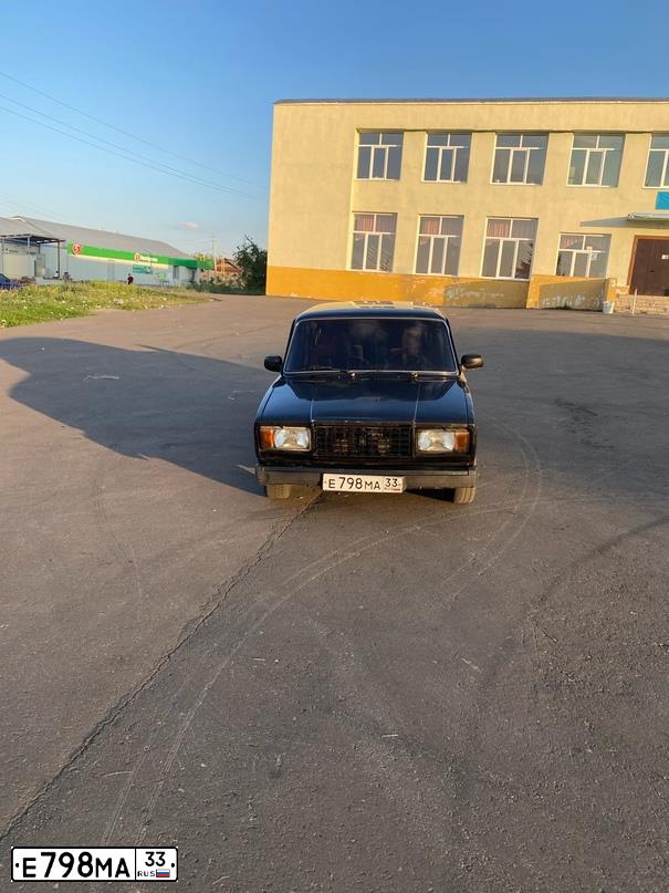 Фото автомобиля LADA 2107 LADA, 2010 — госномер Е798МА33. Цвет: ЧЕРНЫЙ