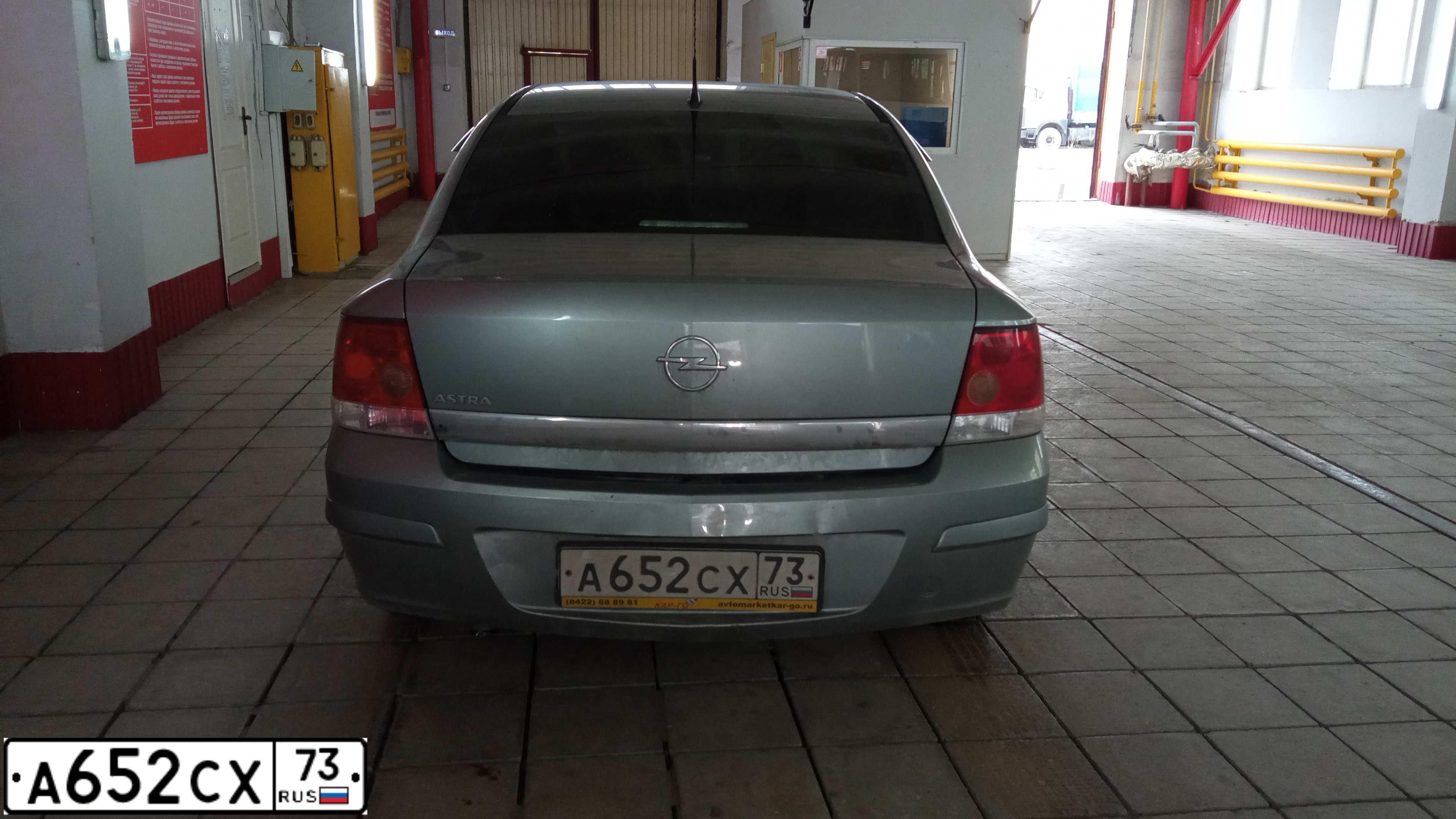 Фото автомобиля OPEL ASTRA, 2011 — госномер А652СХ73. Цвет: СЕРЫЙ