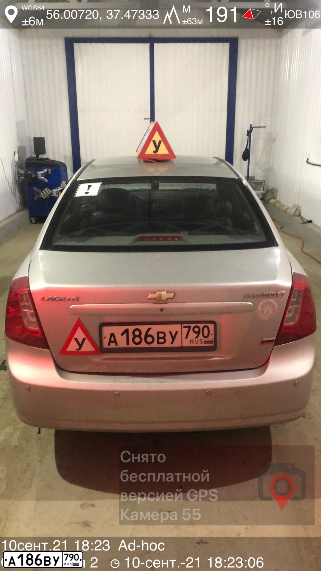 Фото автомобиля CHEVROLET LACETTI, 2011 — госномер В521СН37. Цвет: Серебристый