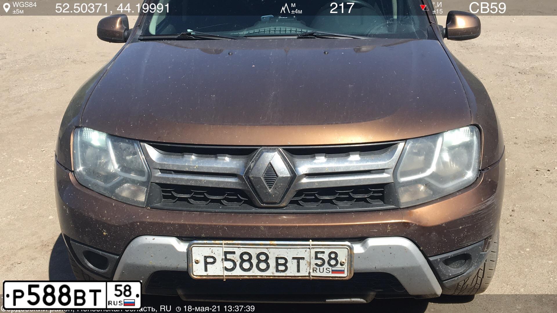 Фото автомобиля RENAULT DUSTER, 2016 — госномер Р588ВТ58. Цвет: КОРИЧНЕВЫЙ