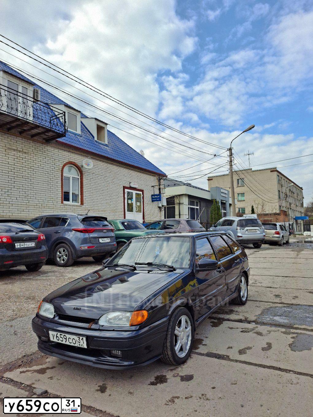 Фото автомобиля LADA 2114 SAMARA, 2006 — госномер Е115ОС31. Цвет: ГРАФИТОВЫЙ МЕТАЛЛИК