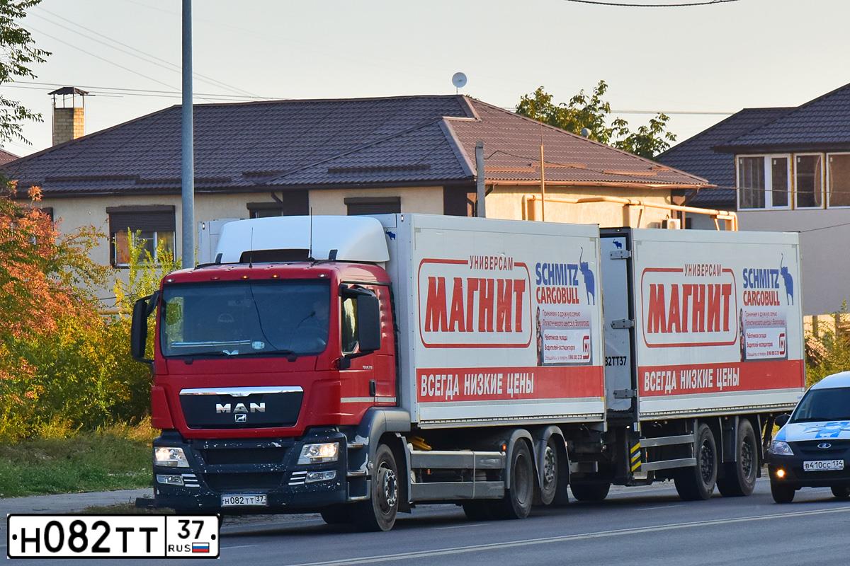 Фото автомобиля MAN TGS 26.XXX /6X2/, 2012 — госномер Н082ТТ37. Цвет: КРАСНО-БЕЛЫЙ