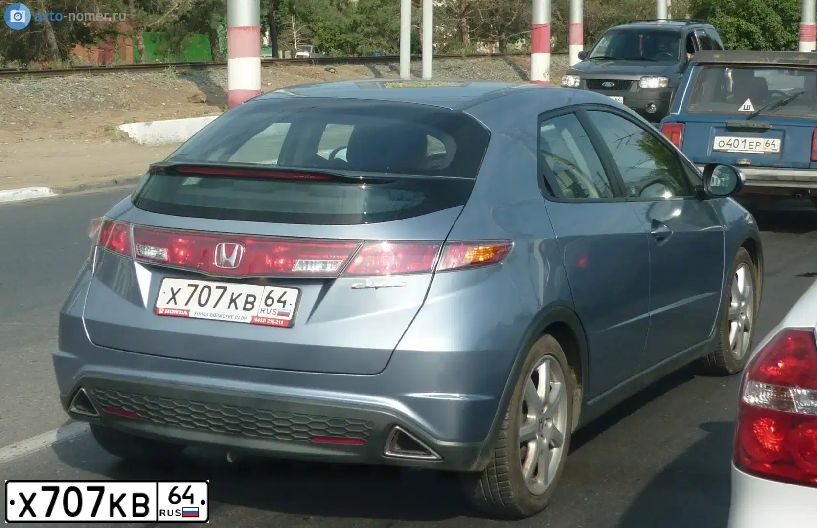 Фото автомобиля HONDA CIVIC, 2008 — госномер Х707КВ64. Цвет: СЕРО ГОЛУБОЙ