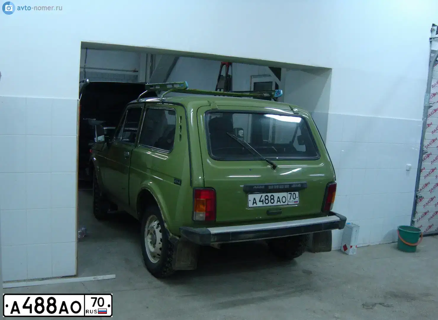 Фото автомобиля LADA 2121 NIVA, 1994 — госномер А488АО70. Цвет: ЗЕЛЕНЫЙ