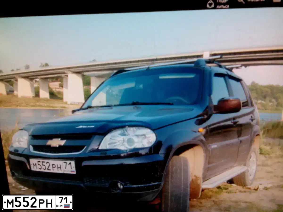 Фото автомобиля CHEVROLET NIVA, 2010 — госномер Х547ВХ71. Цвет: Темно-коричневый металлик