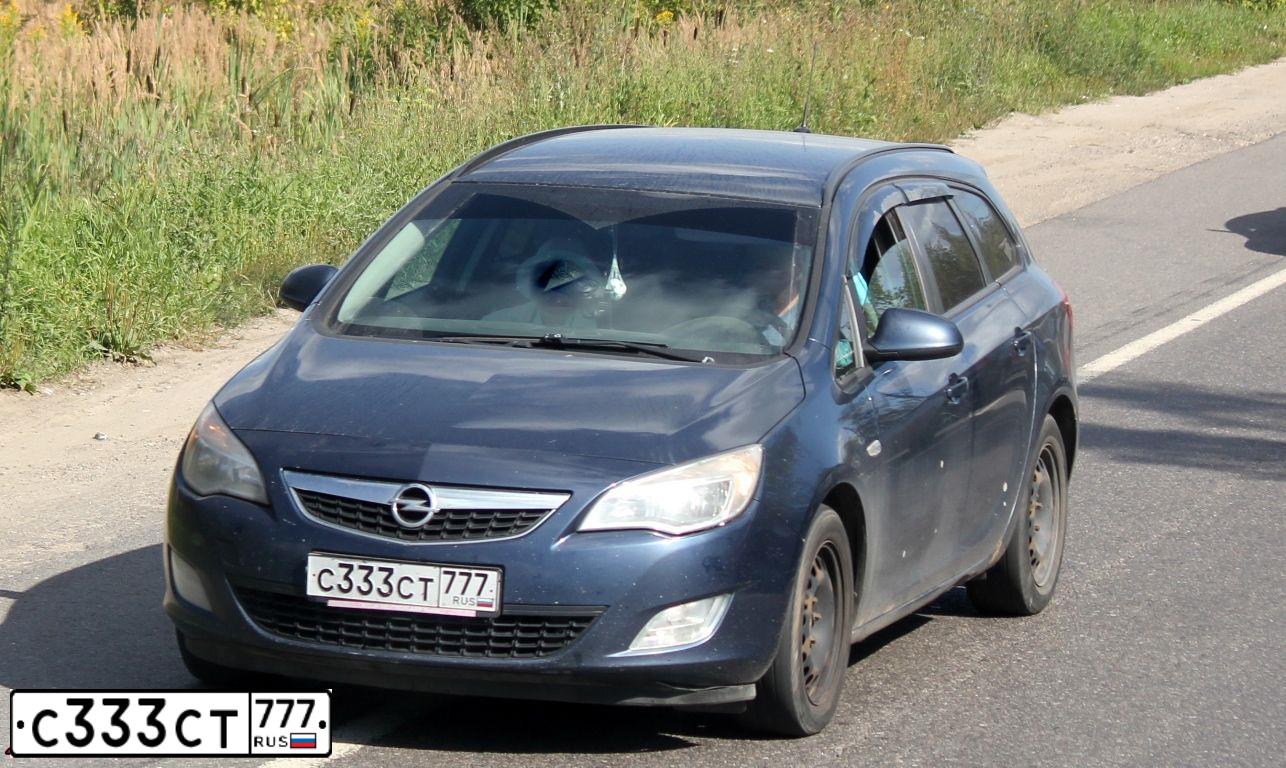 Фото автомобиля OPEL ASTRA, 2011 — госномер С333СТ777. Цвет: Темно-синий