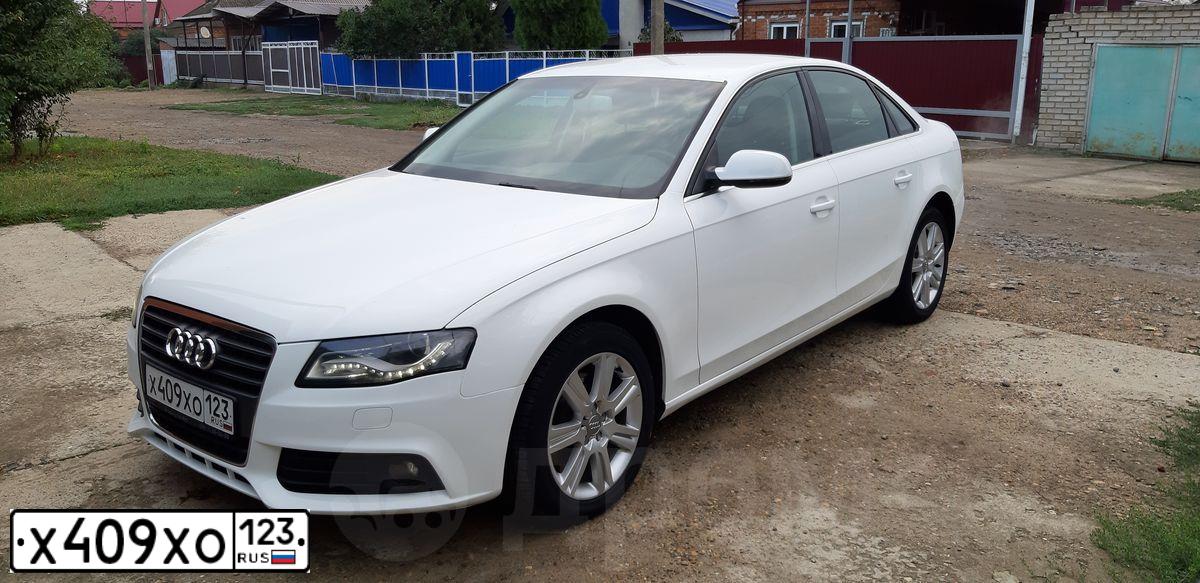 Фото автомобиля AUDI A4, 2011 — госномер Х409ХО123. Цвет: Белый