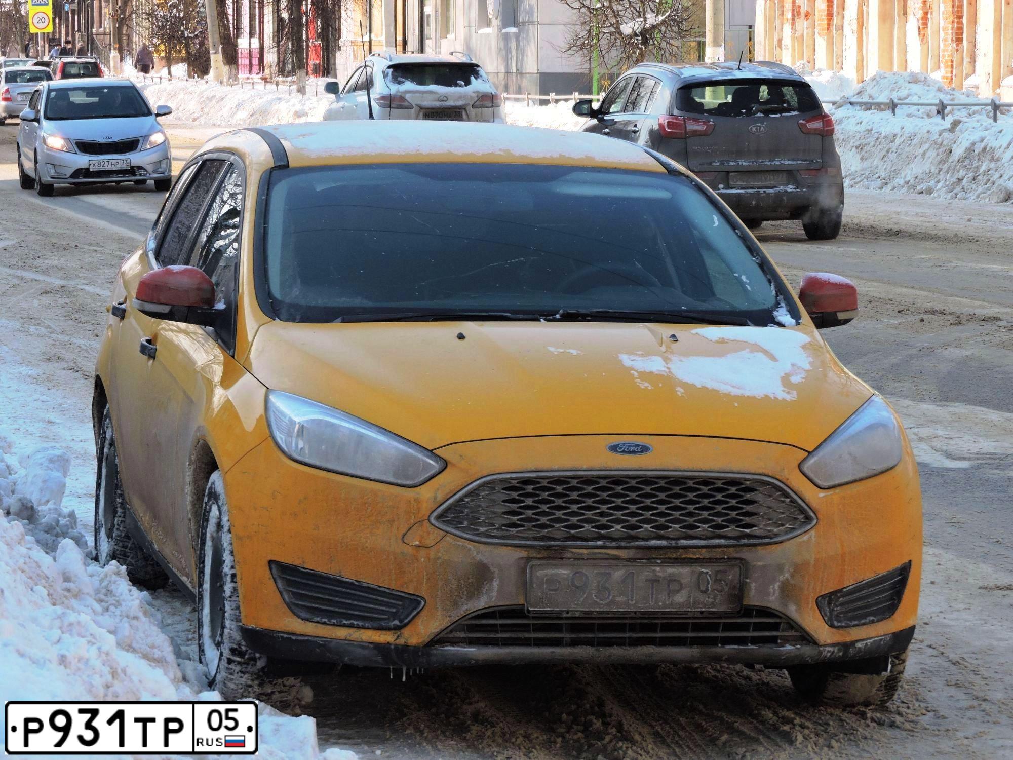 Фото автомобиля FORD FOCUS, 2016 — госномер Р931ТР05. Цвет: ЖЁЛТЫЙ