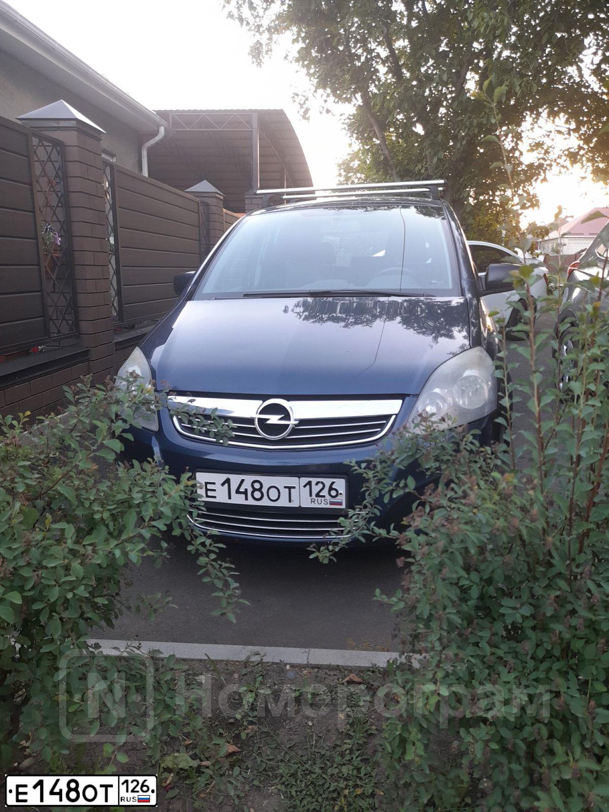 Фото автомобиля OPEL ZAFIRA, 2010 — госномер Е148ОТ126. Цвет: СИНИЙ