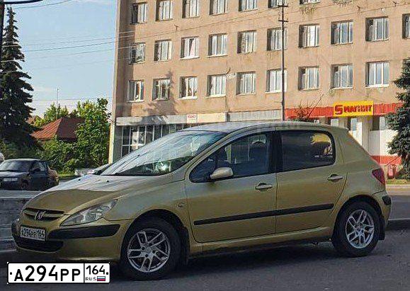Фото автомобиля PEUGEOT 307, 2002 — госномер А294РР164. Цвет: ЖЁЛТЫЙ