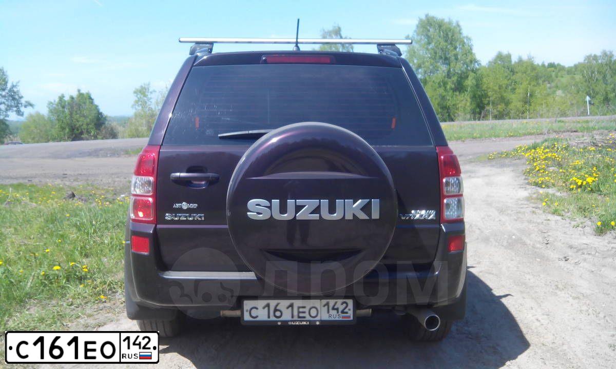 Фото автомобиля SUZUKI GRAND VITARA, 2008 — госномер Е357СК124. Цвет: ФИОЛЕТОВЫЙ