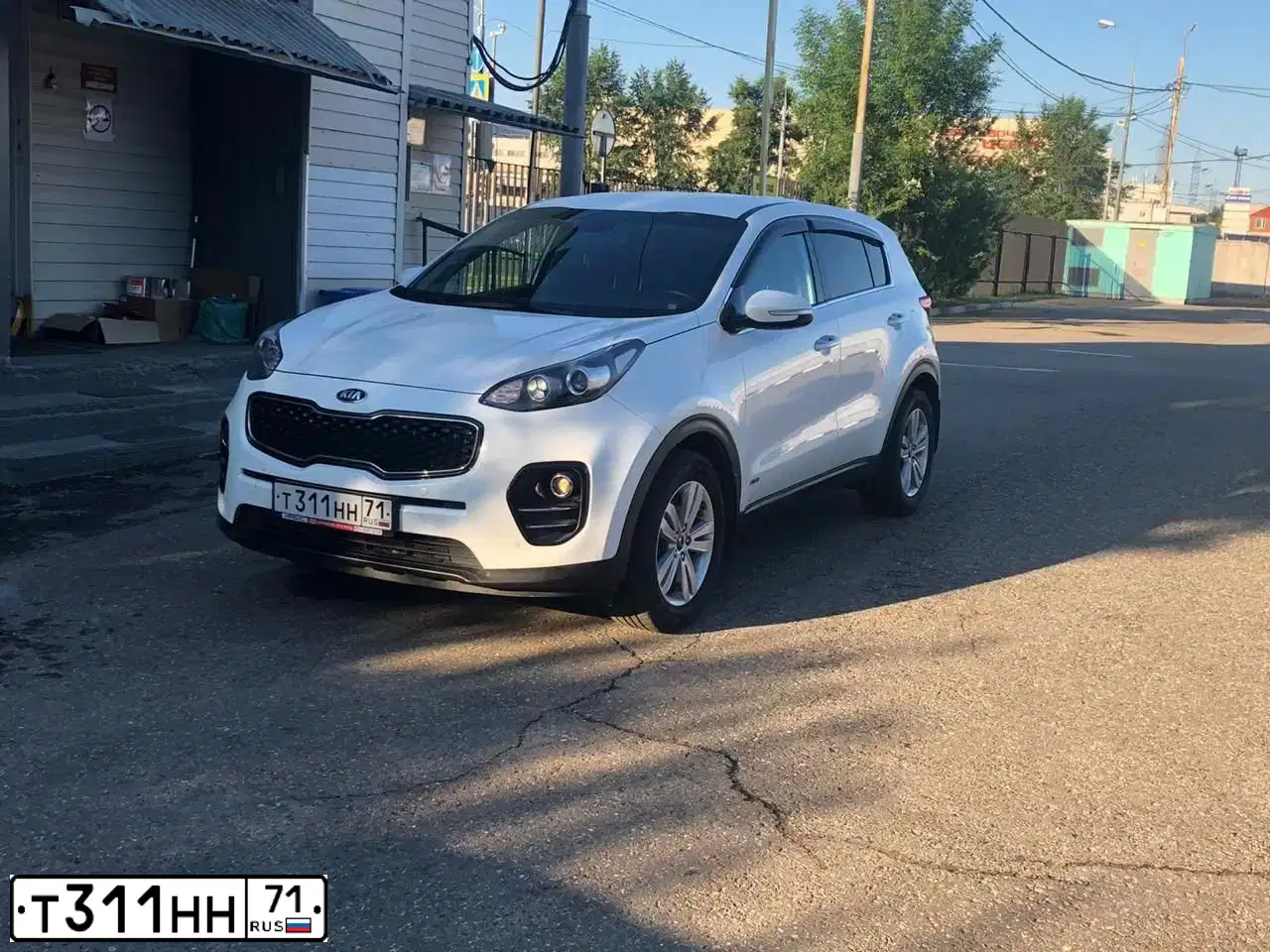 Фото автомобиля KIA SPORTAGE, 2017 — госномер А642КР76. Цвет: Белый