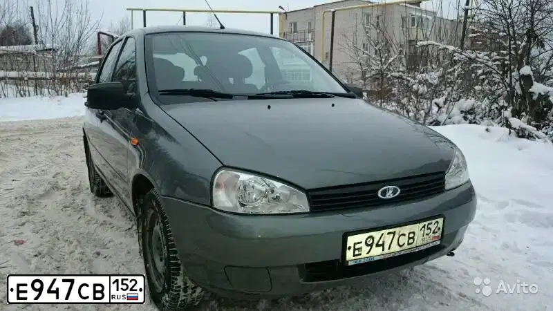 Фото автомобиля LADA 1119 KALINA, 2011 — госномер Е947СВ152. Цвет: СЕРО-ЗЕЛЕНЫЙ