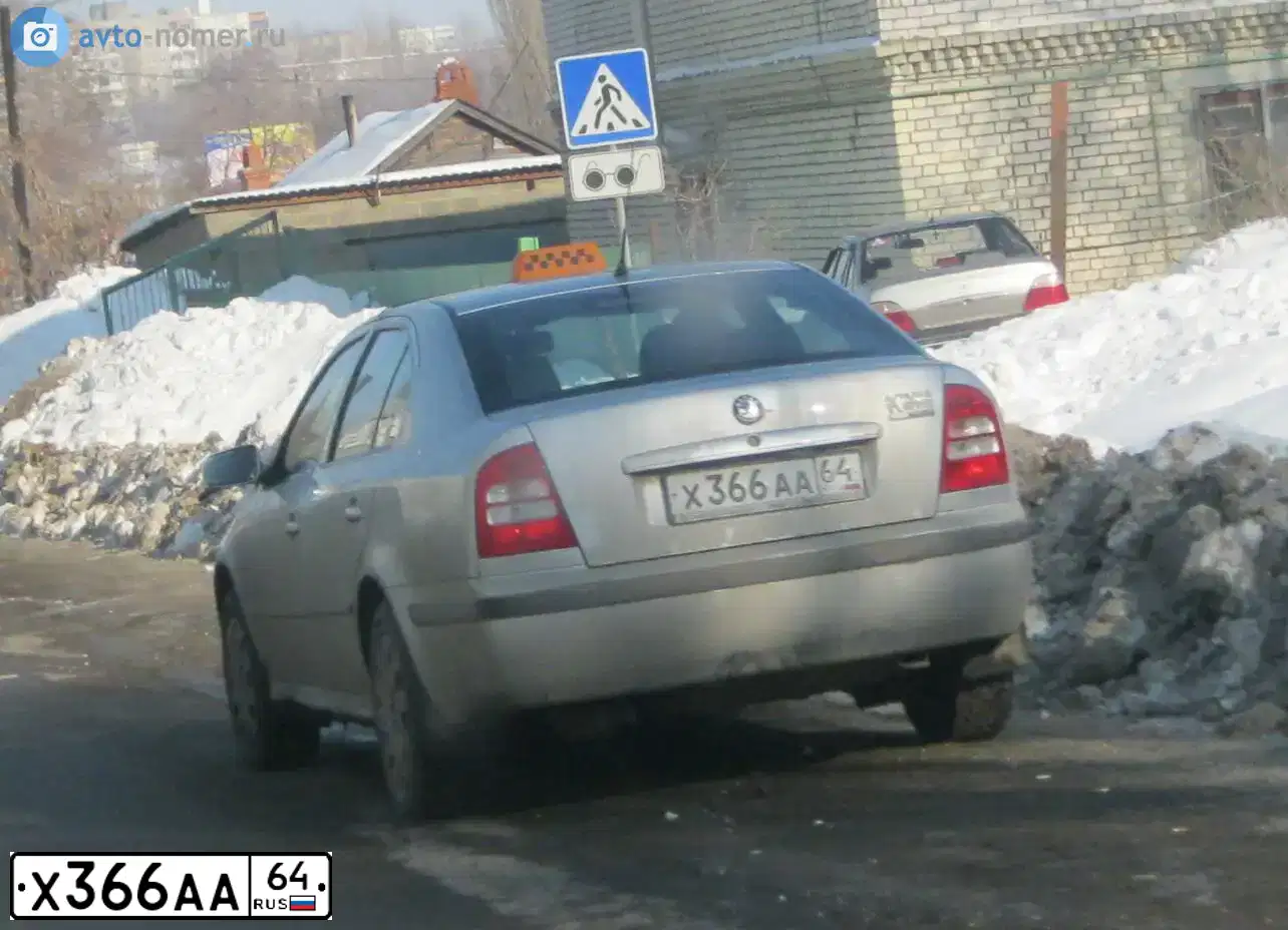 Фото автомобиля SKODA OCTAVIA, 2008 — госномер Х366АА64. Цвет: СЕРЕБРИСТЫЙ