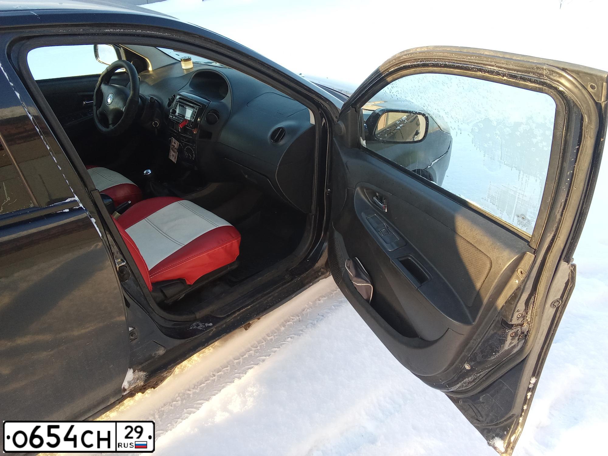 Фото автомобиля GEELY MK, 2008 — госномер О654СН29. Цвет: ЧЕРНЫЙ