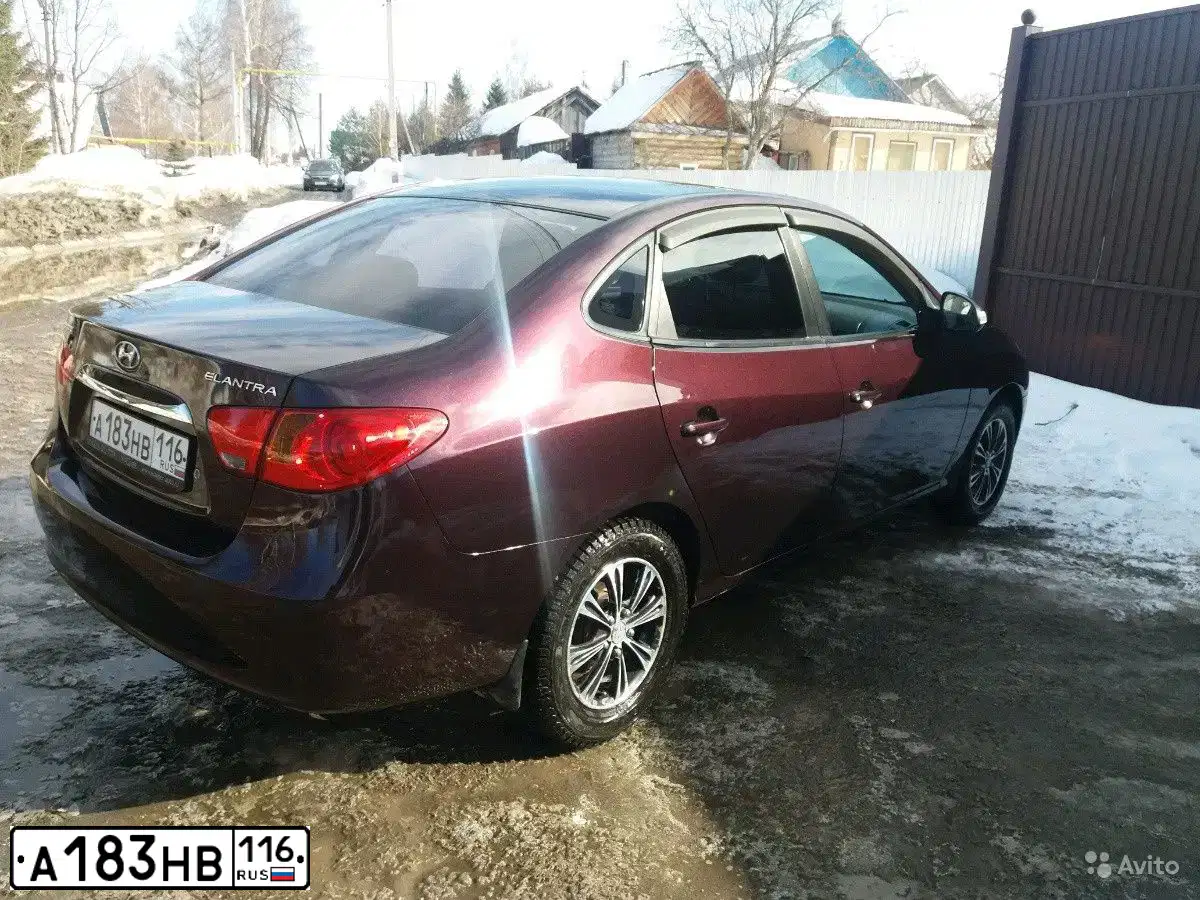Фото автомобиля HYUNDAI ELANTRA, 2010 — госномер А183НВ116. Цвет: ВИШНЕВЫЙ