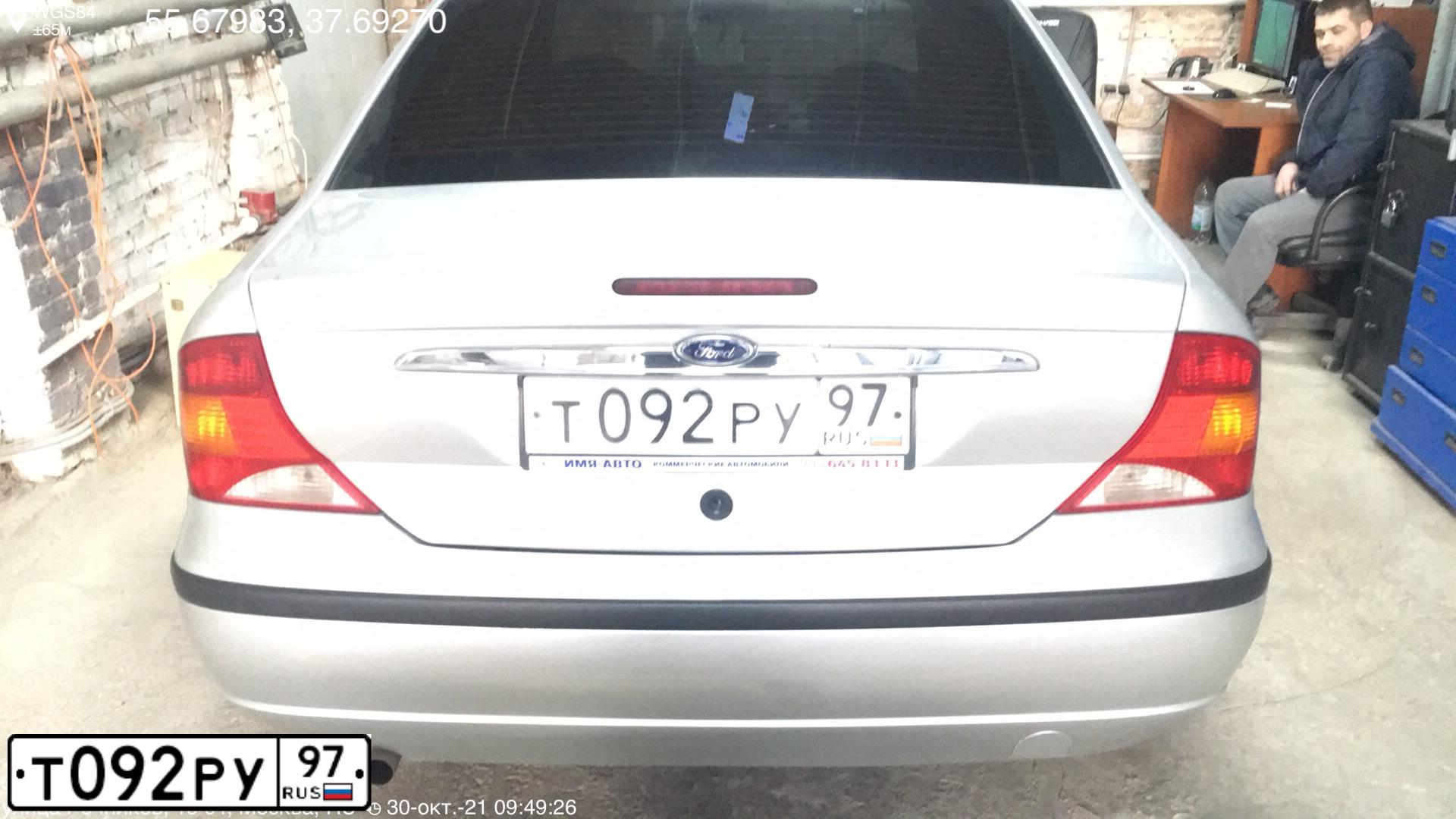 Фото автомобиля FORD FOCUS, 2004 — госномер Т092РУ97. Цвет: СЕРЫЙ