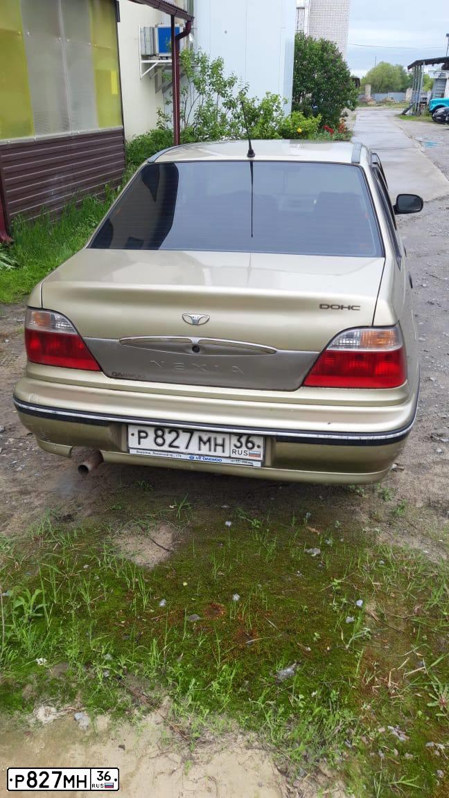 Фото автомобиля ДЭУ НЕКСИЯ, 2005 — госномер Р827МН36. Цвет: ЖЕЛТЫЙ