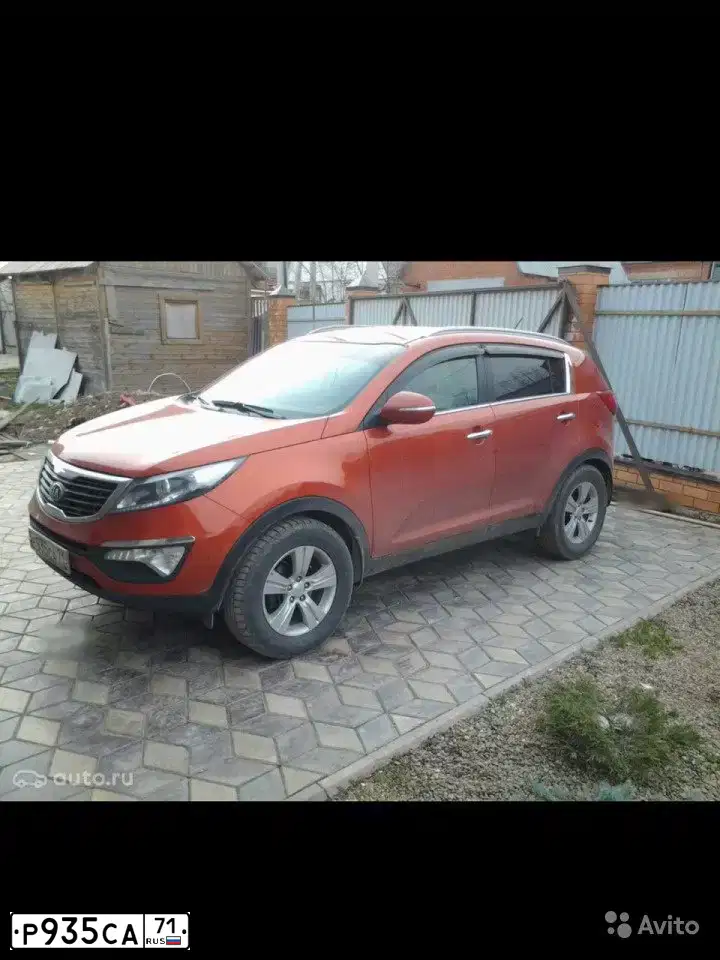 Фото автомобиля KIA SPORTAGE, 2013 — госномер Р935СА71. Цвет: ОРАНЖЕВЫЙ