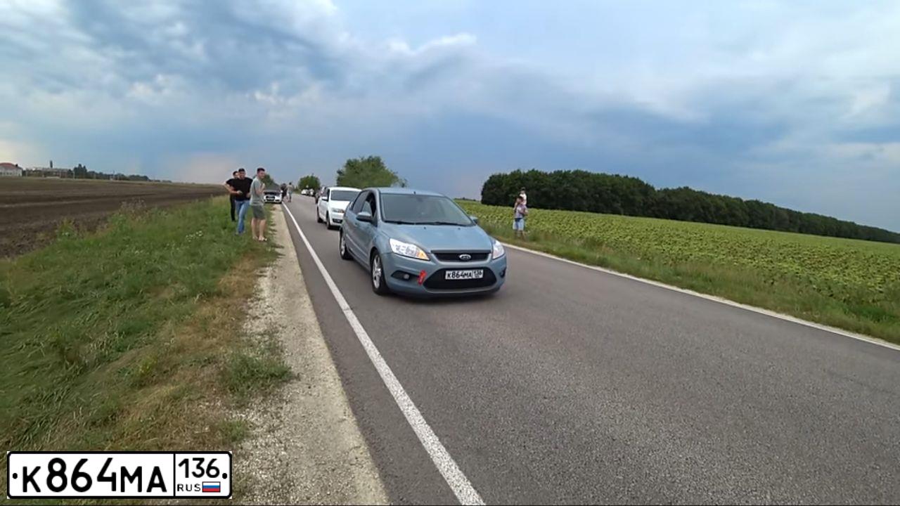 Фото автомобиля FORD FOCUS, 2010 — госномер Н008АХ136. Цвет: СЕРО-ГОЛУБОЙ