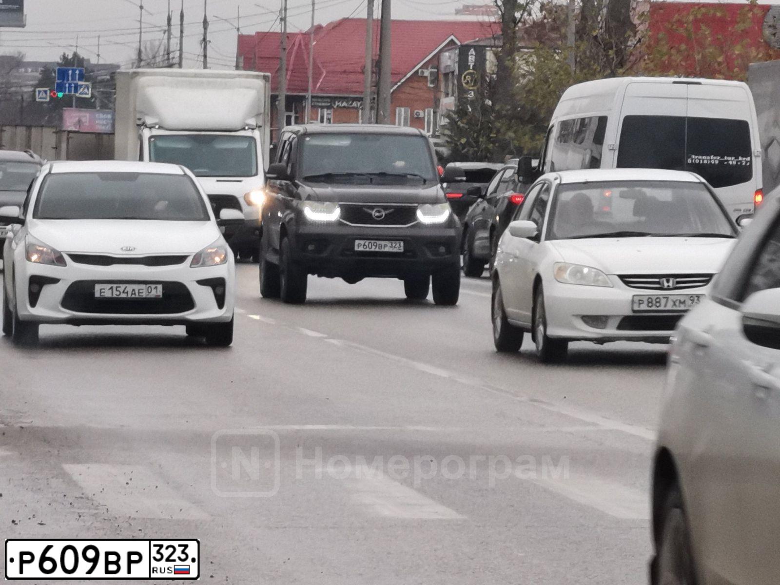 Фото автомобиля UAZ 3163 PATRIOT, 2017 — госномер Р609ВР323. Цвет: Коричневый