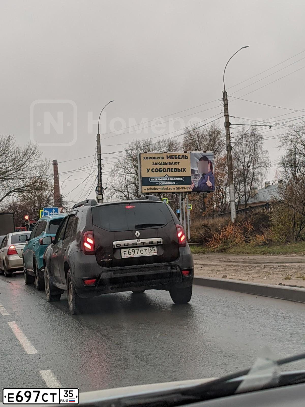 Фото автомобиля RENAULT DUSTER, 2016 — госномер Е697СТ35. Цвет: ТЕМНО-КОРИЧНЕВЫЙ