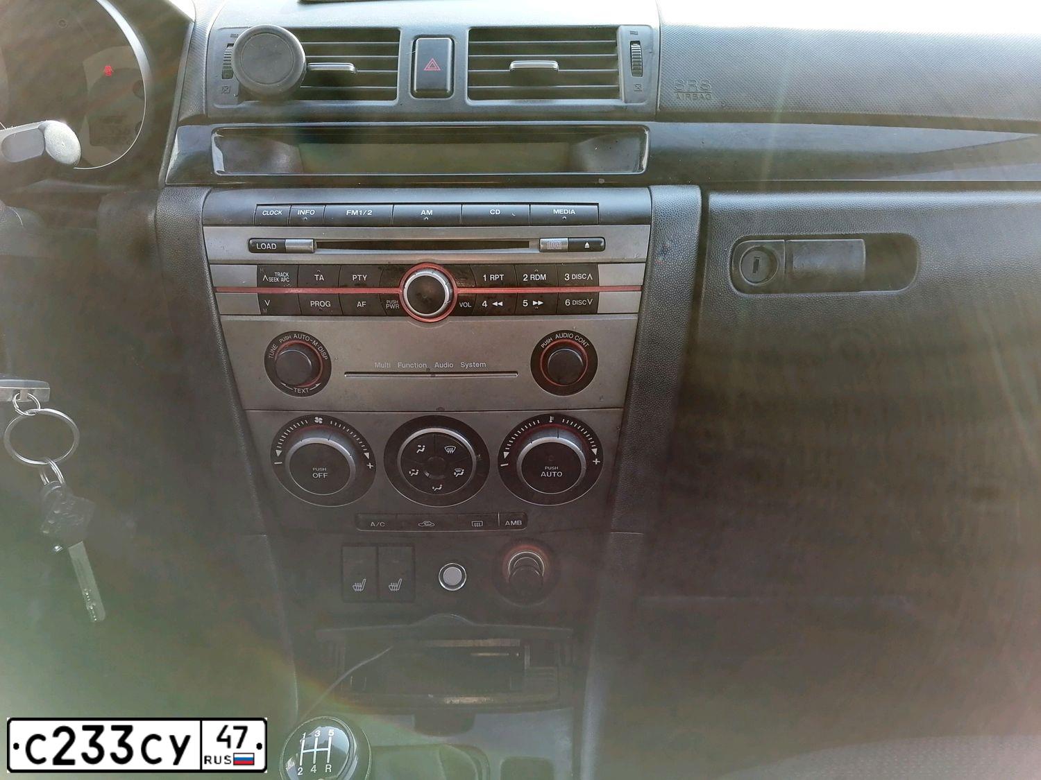 Фото автомобиля MAZDA 3, 2007 — госномер Н281КЕ10. Цвет: СИНЕ ЗЕЛЕНЫЙ
