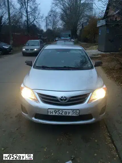 Фото автомобиля TOYOTA COROLLA, 2010 — госномер К426ЕК164. Цвет: СЕРЕБРИСТЫЙ