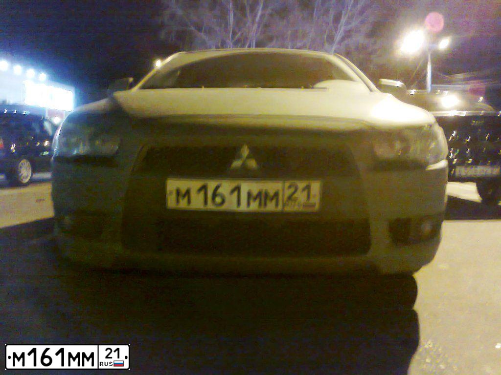 Фото автомобиля MITSUBISHI LANCER, 2007 — госномер М727УУ21. Цвет: СВЕТЛО-СЕРО-ЗЕЛЕНЫЙ
