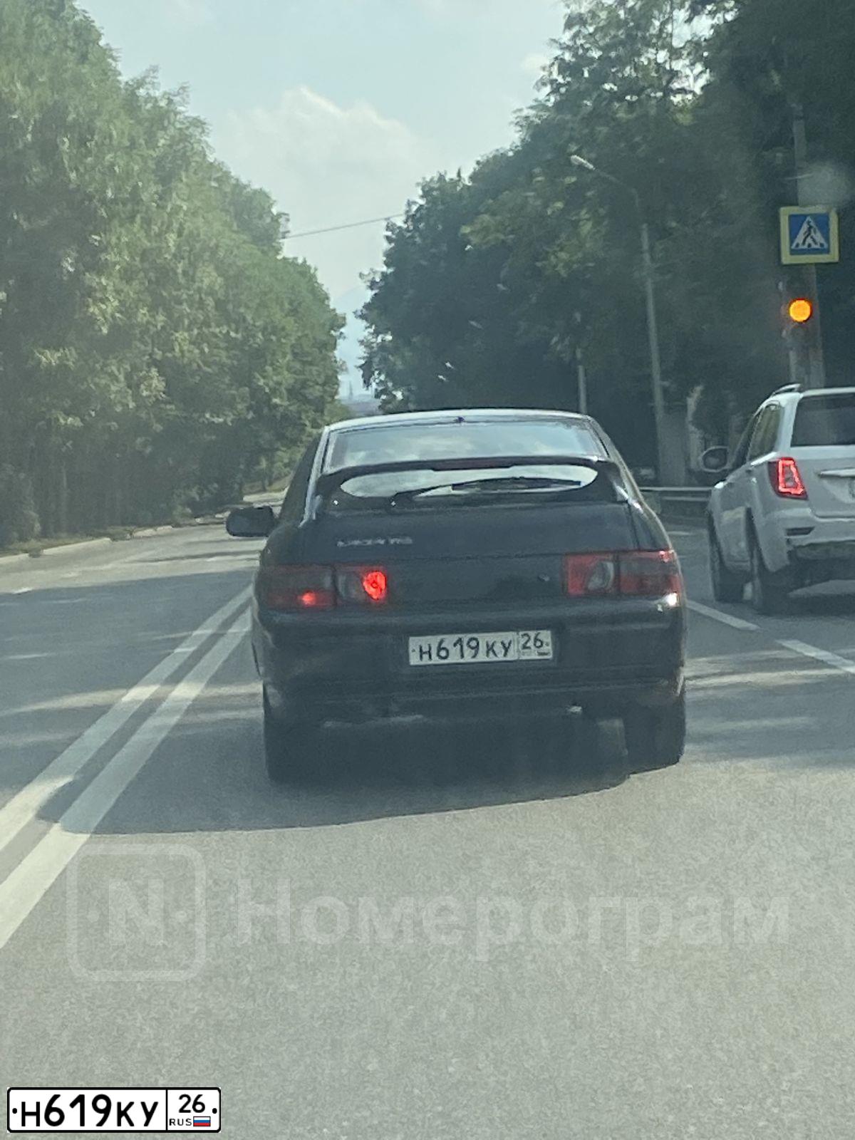 Фото автомобиля LADA 2112, 2003 — госномер Н218МА07
