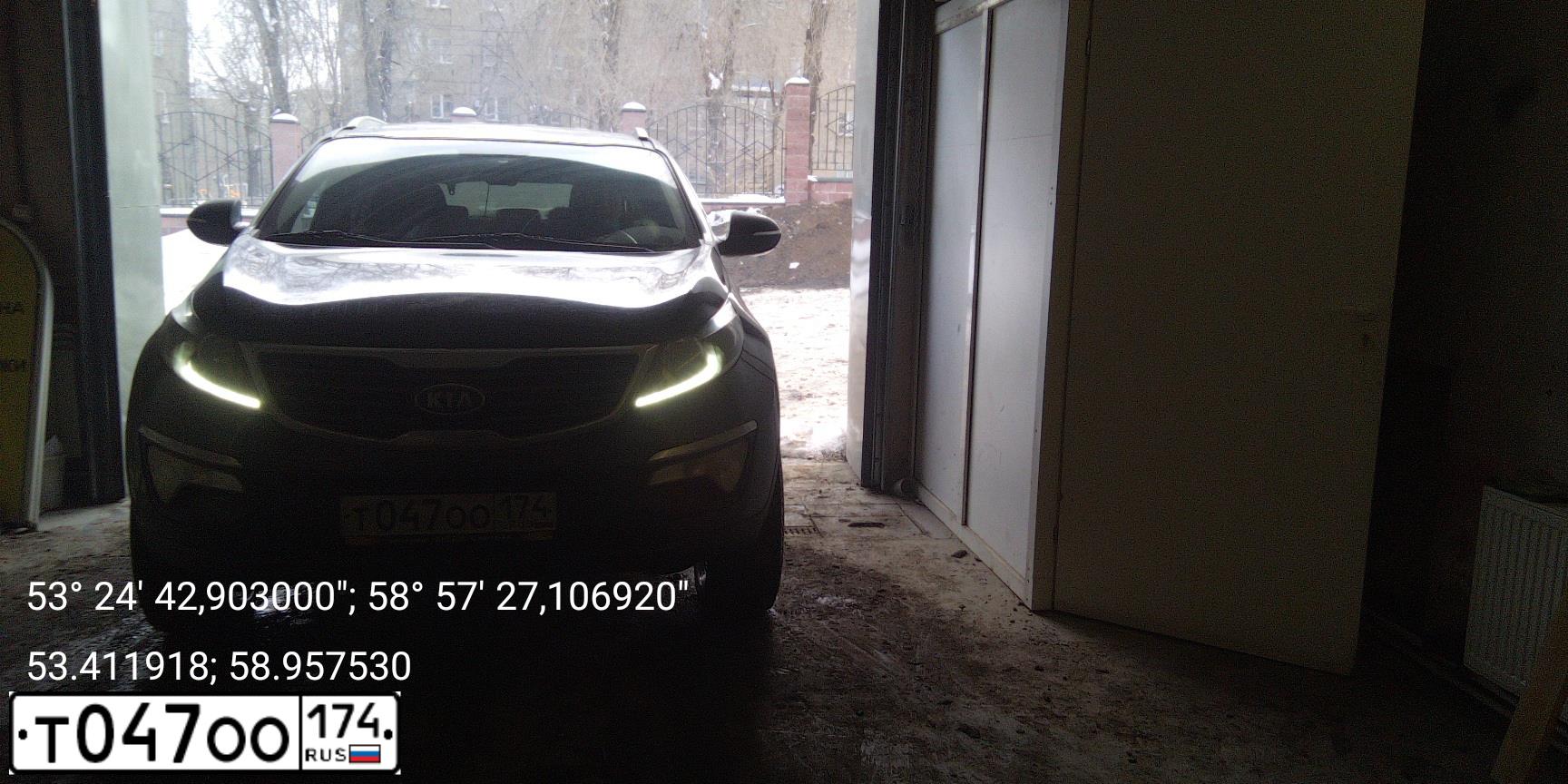 Фото автомобиля KIA SPORTAGE, 2011 — госномер Т047ОО174. Цвет: СИНИЙ