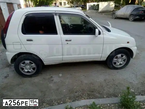 Фото автомобиля ДАЙХАТСУТЕРИОСКИД, 2002 — госномер А256РЕ154