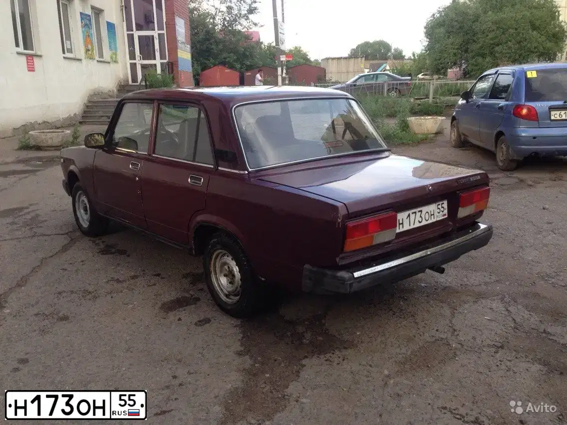 Фото автомобиля LADA 2107, 2007 — госномер Н173ОН55. Цвет: ТЕМНО-ВИШНЕВЫЙ
