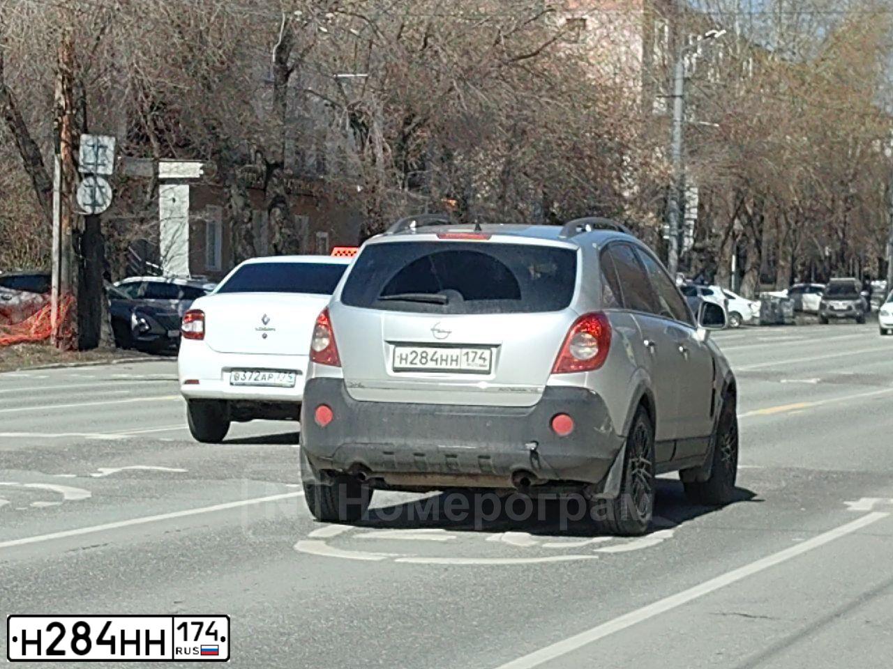 Фото автомобиля OPEL ASTRA, 2006 — госномер Н284НН174. Цвет: БЕЖЕВО-СЕРЫЙ