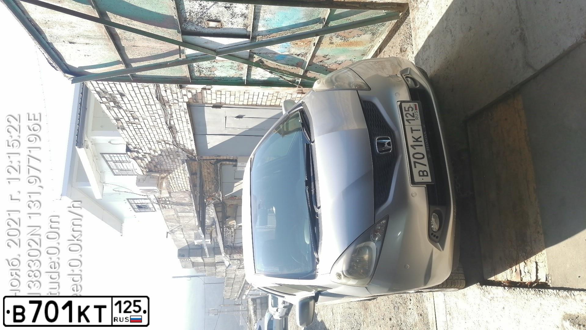 Фото автомобиля HONDA FIT, 2010 — госномер В701КТ125
