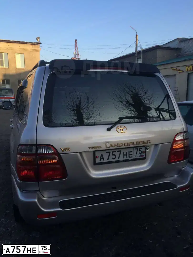 Фото автомобиля TOYOTA LANDCRUISER, 1999 — госномер А757НЕ75. Цвет: Серебристый
