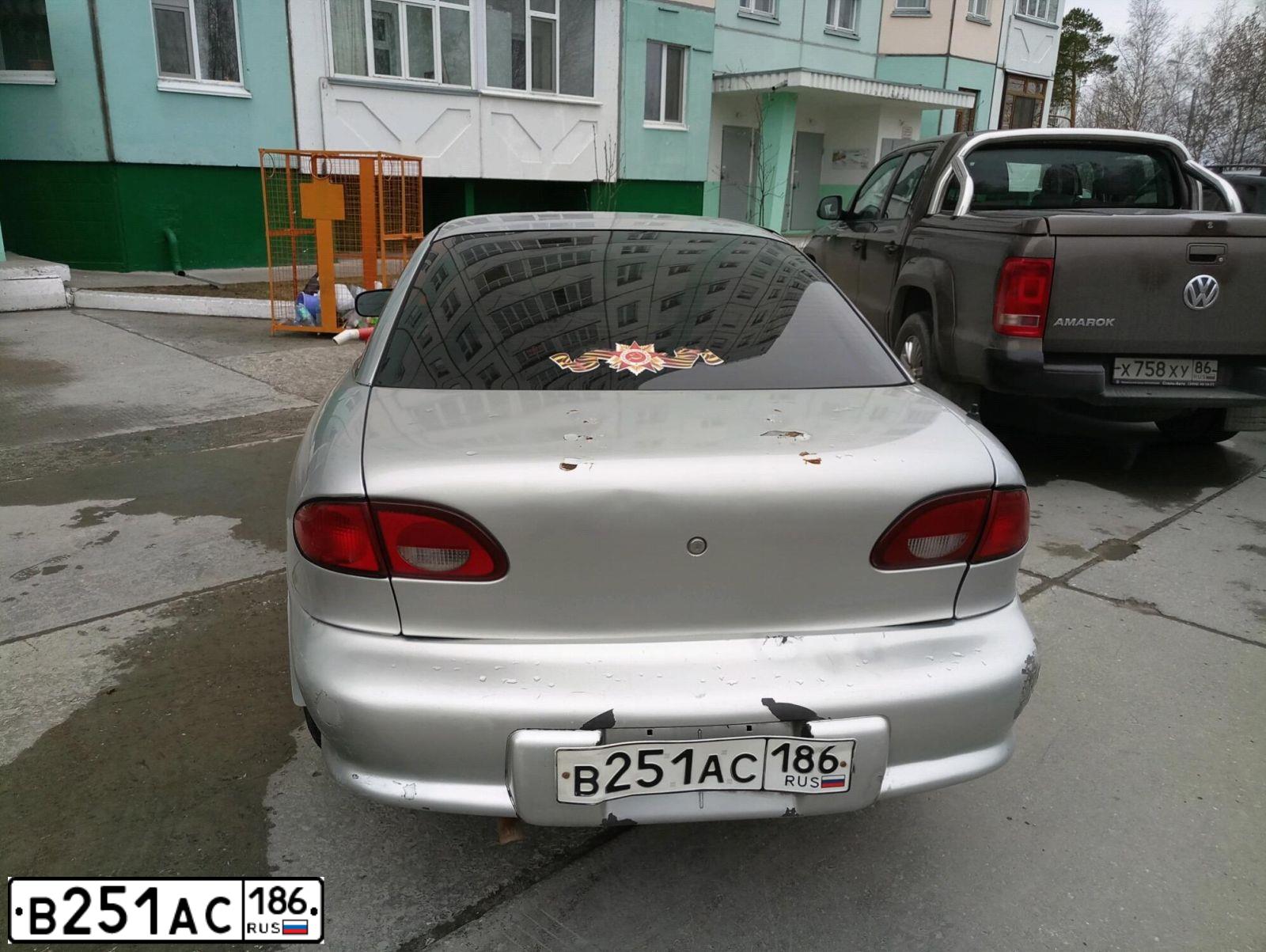 Фото автомобиля CHEVROLET CAVALIER, 2000 — госномер К715НА186. Цвет: Серебристый