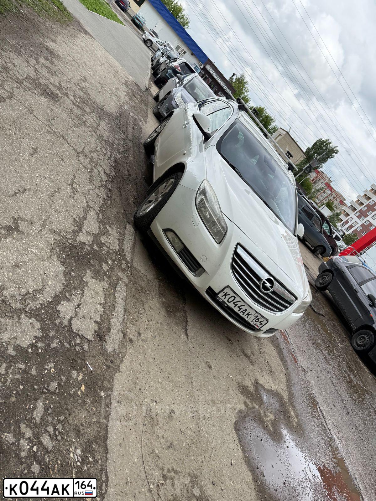 Фото автомобиля OPEL INSIGNIA, 2011 — госномер К044АК164. Цвет: Белый