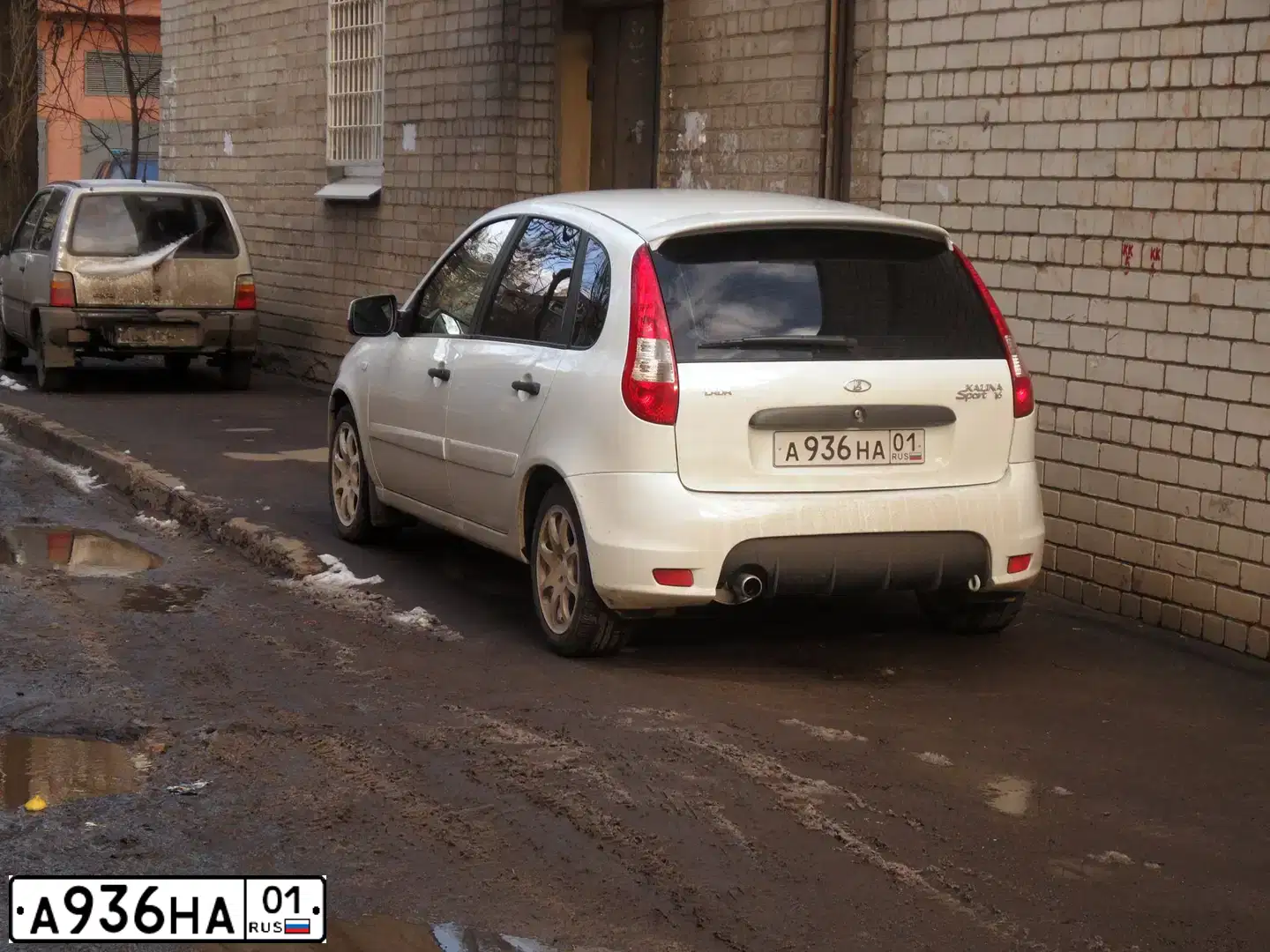 Фото автомобиля LADA 1119 KALINA, 2012 — госномер А936НА01. Цвет: БЕЛЫЙ