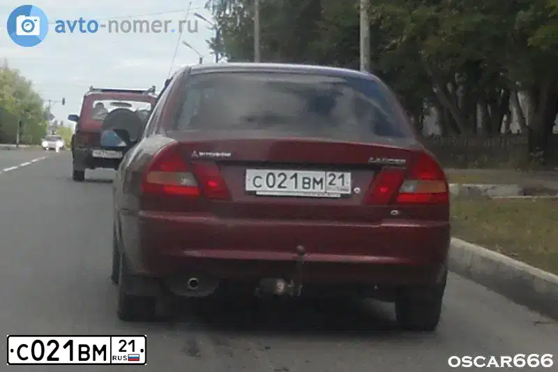 Фото автомобиля MITSUBISHI LANCER, 2007 — госномер С021ВМ21. Цвет: ЧЕРНЫЙ