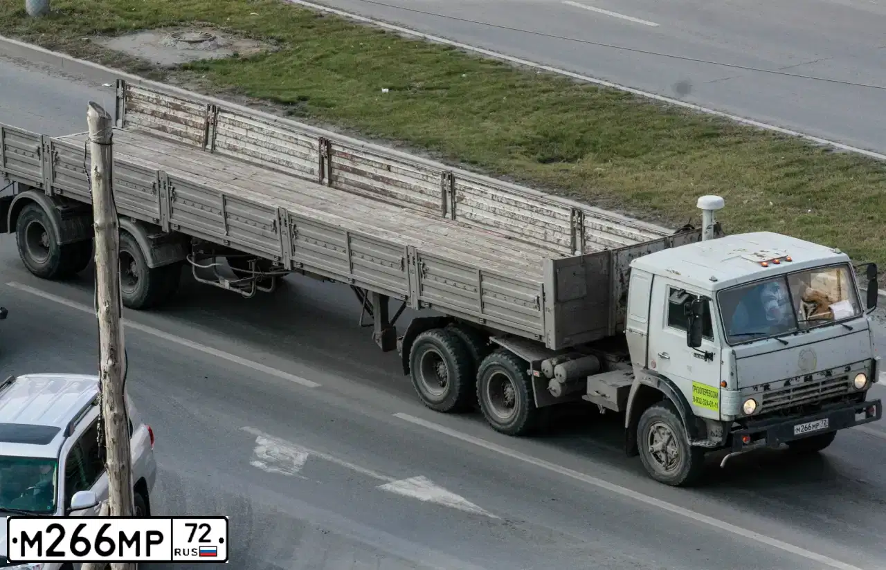 Фото автомобиля LADA 2112, 2000 — госномер Х247РТ72. Цвет: ЗЕЛЕНО-ГОЛУБОЙ