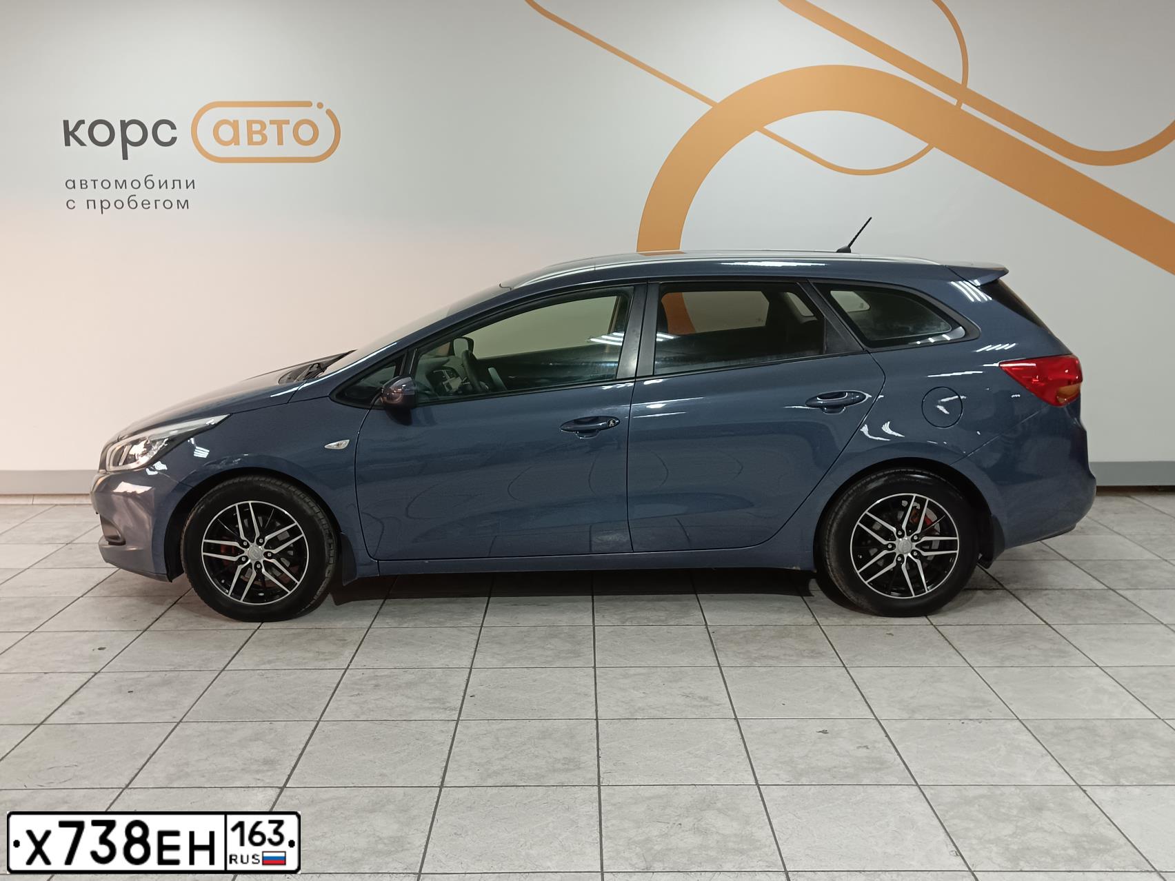 Фото автомобиля KIA CEE'D, 2014 — госномер Т060СХ31. Цвет: синий