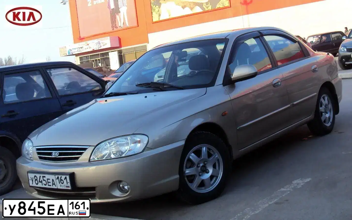 Фото автомобиля KIA SPECTRA, 2008 — госномер У845ЕА161. Цвет: ЗОЛОТИСТО БЕЖЕВЫЙ