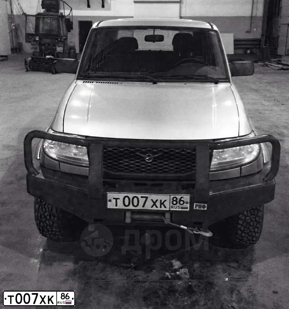 Фото автомобиля UAZ PICKUP, 2012 — госномер Т007ХК86. Цвет: СЕРЕБ ЖЕЛТ МЕТАЛЛИК