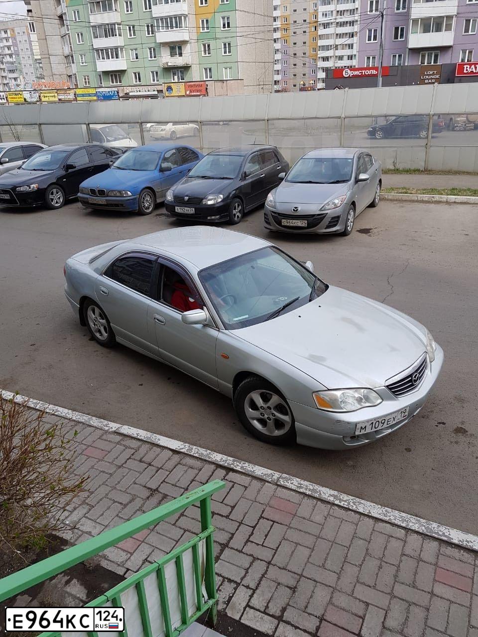 Фото автомобиля SKODA OCTAVIA, 2012 — госномер Е964КС124. Цвет: ЧЕРНЫЙ