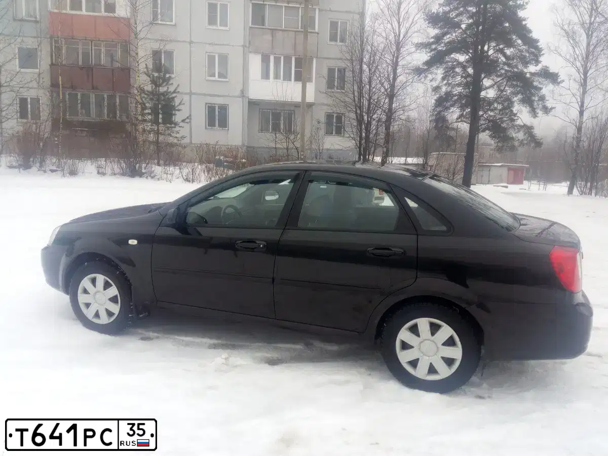 Фото автомобиля CHEVROLET LACETTI, 2007 — госномер Т641РС35. Цвет: ЧЕРНЫЙ